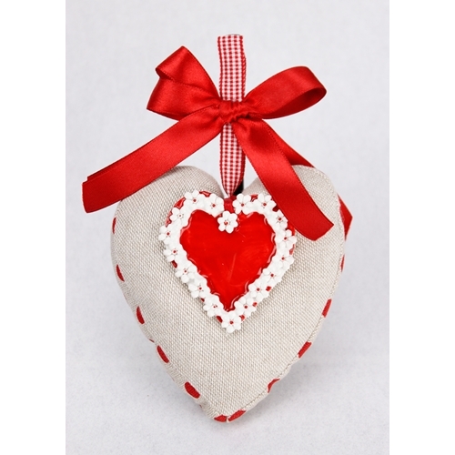 Cuscinetto in tela a forma di cuore con accessorio in ceramica