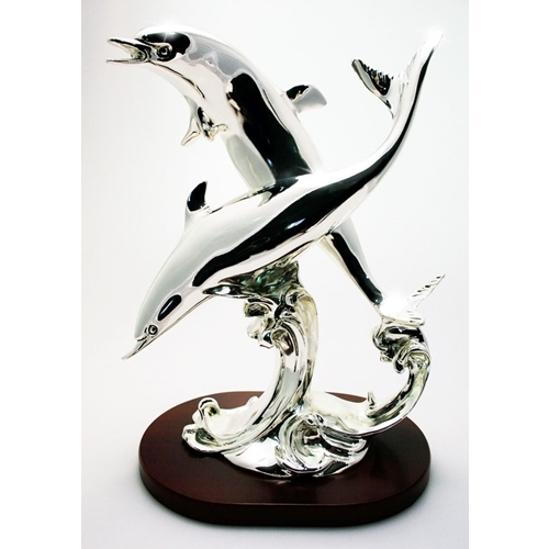 Coppia di delfini in argento
