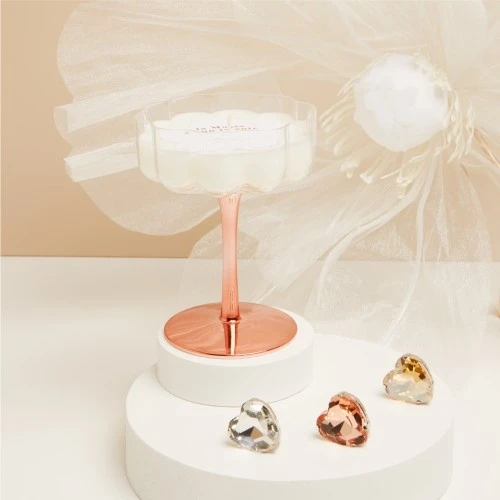 CANDELA IN BICCHIERE ORO ROSA - CLARALUNA 2025